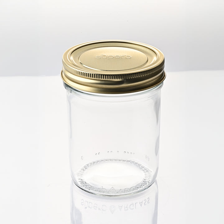 Empty wide mouth canning jars ready for use Wide mouth canning jar with airtight lid High-quality canning jars for food storage Wide mouth glass canning jar with metal lid from Superb